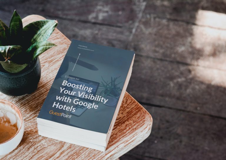 book on coffee table entitled Boosting Your Visibility With Google Hotels