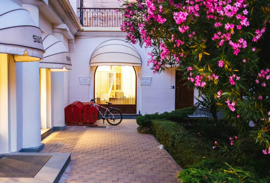 exterior of a beautiful hotel courtyard at dusk used on a blog about what a boutique hotel is
